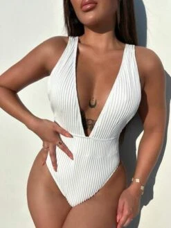 Solid Plunging One Piece Swimsuit -Shein Clothing Store 1681385515177d5e3fde488ef8f39a2bbf71e68120 thumbnail 405x552